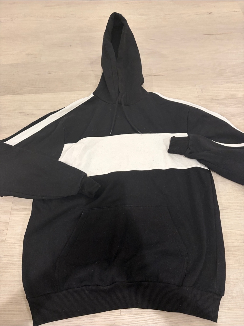 H&M Black Hoodie with White Chest Stripe and Shoulder Accents